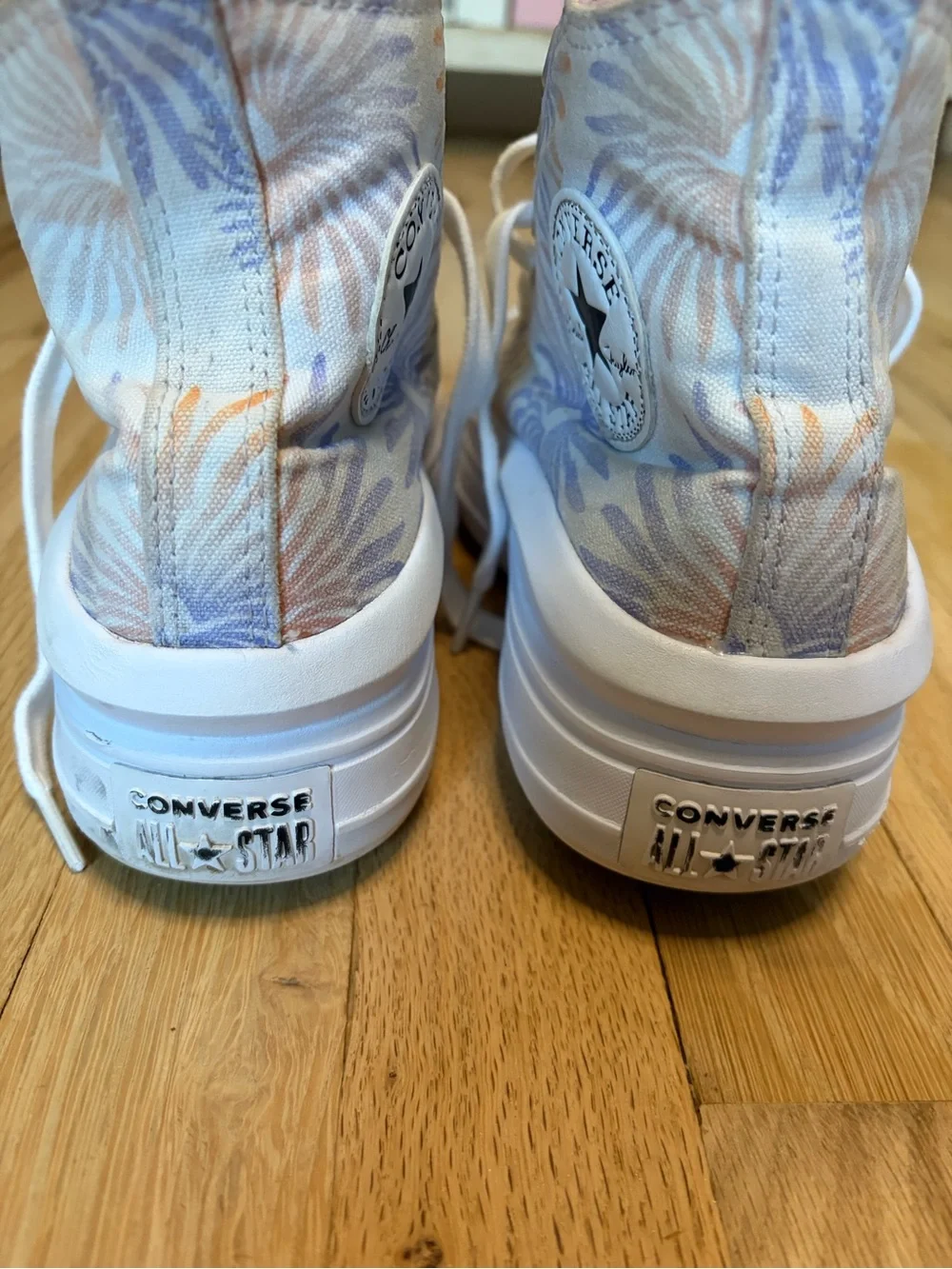 Converse High-Top Sneakers in Pale Pink and White with Subtle Floral Print